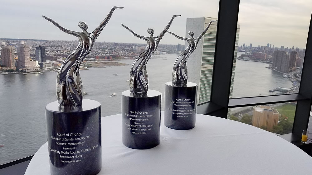 The first three Agent of Change Awards, with the UN in the background, 1000px
